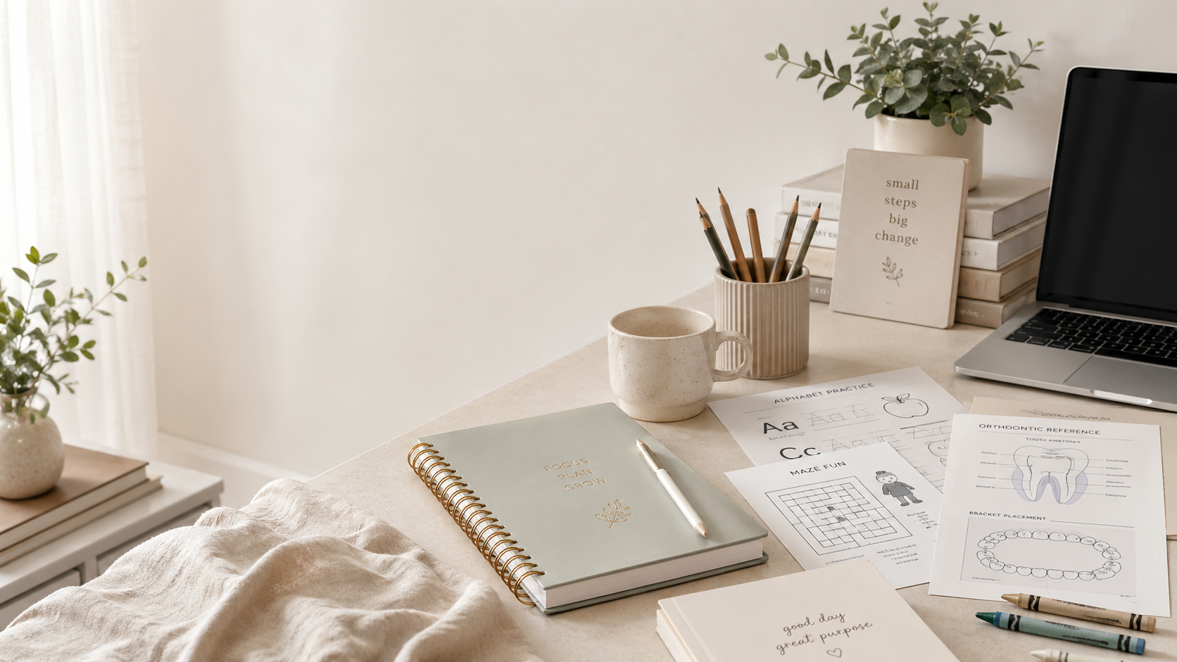 Warm editorial desk scene with journal, mug, and neutral still life